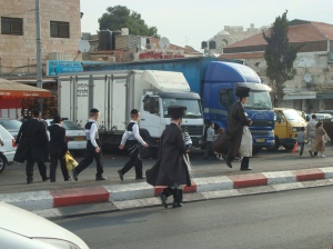 Jews on their way to the Western Wall during the feast